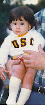 Elizabth Cutler USC Baby photo of Elizabeth Cutler wearing a USC sweatshirt
